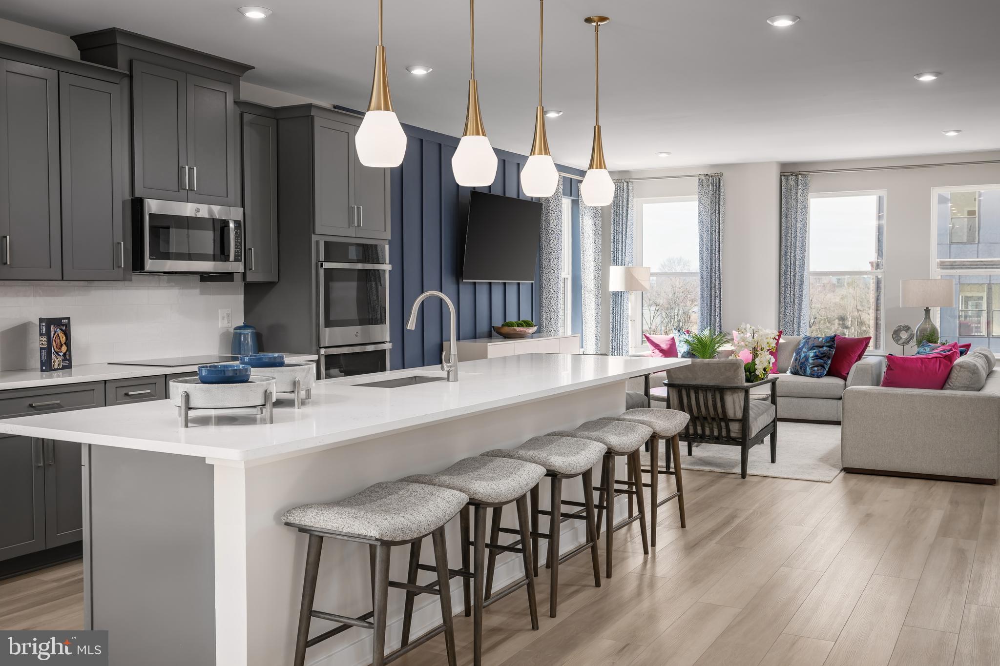 2167 Glacier Road Herndon, VA 20170 - Photo 8 of 32 a large kitchen with a table and chairs