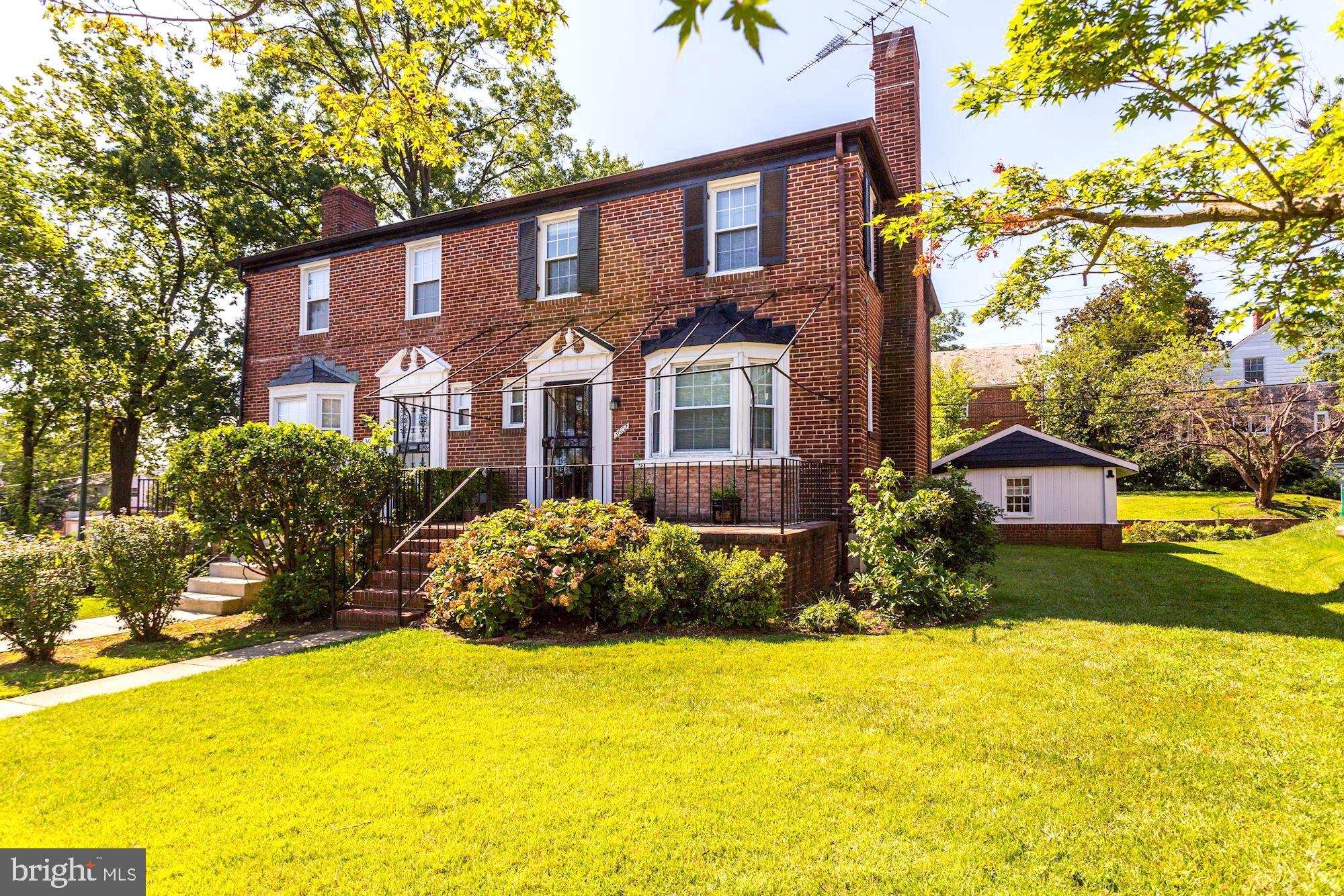 3602 Delverne Road Baltimore, MD 21218 - Photo 1 of 28 a front view of house and yard with swimming pool and porch