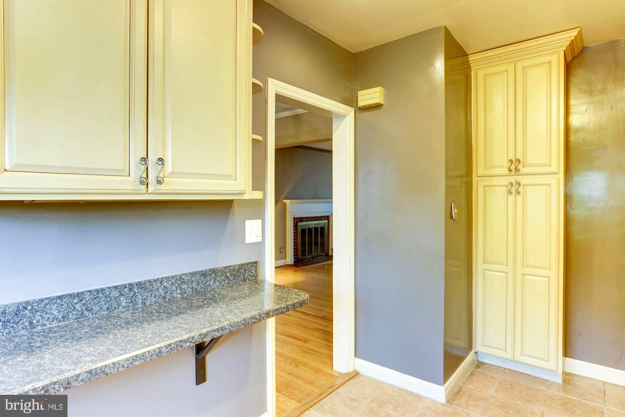 3602 Delverne Road Baltimore, MD 21218 - Photo 12 of 28 a view of cabinet and mirror