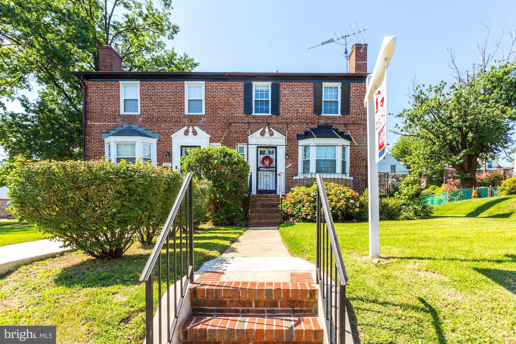 3602 Delverne Road Baltimore, MD 21218 - Photo 3 of 28 a front view of a house with a yard