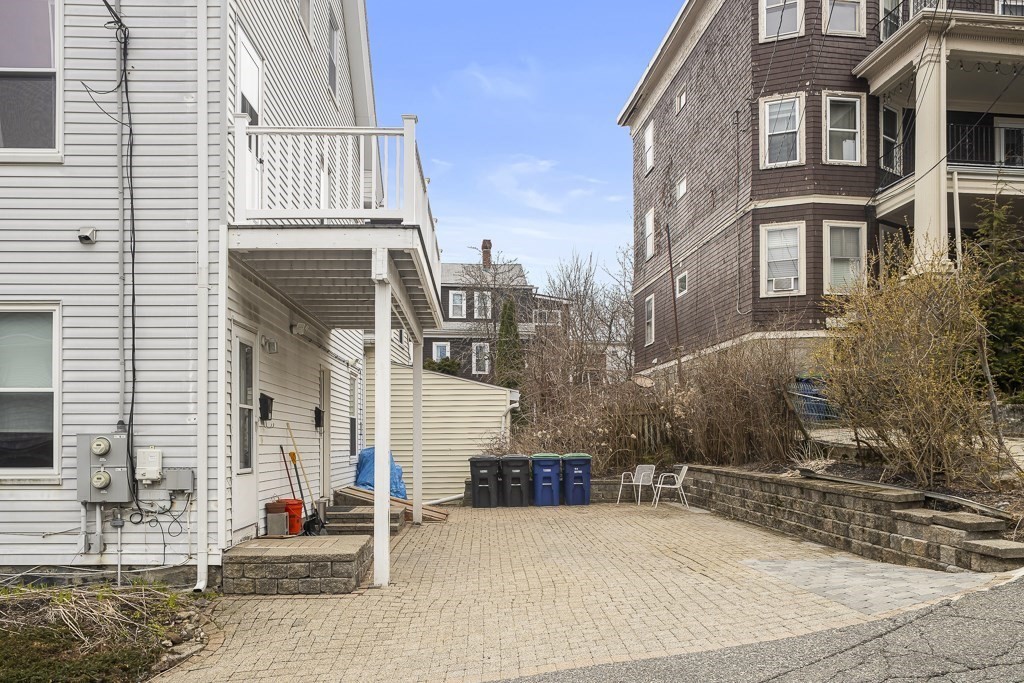 55 Main Street Somerville, MA 02145 - Photo 28 of 28 a view of a building with many windows
