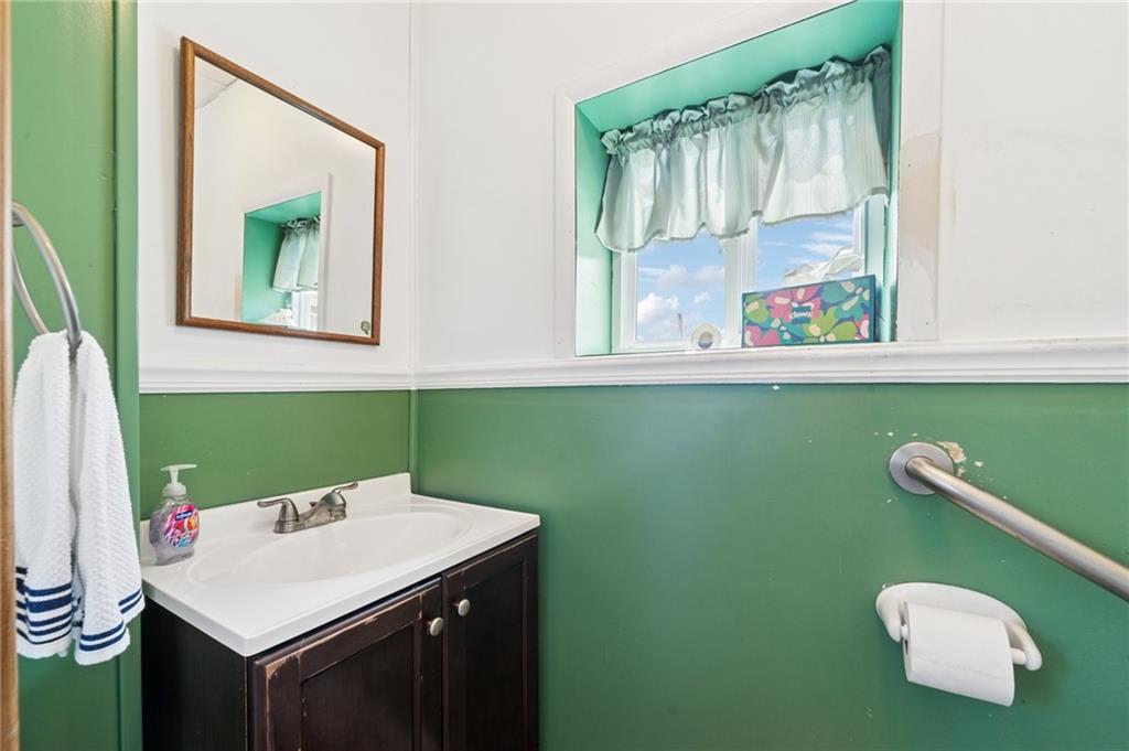 600 Scott Street Penn, PA 15675 - Photo 14 of 33 a bathroom with a sink and a window