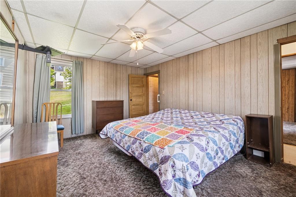 600 Scott Street Penn, PA 15675 - Photo 16 of 33 a bedroom with a bed dresser and a large window