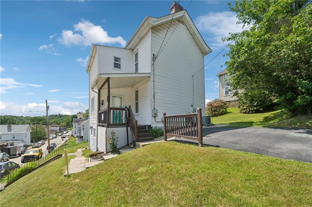 600 Scott Street Penn, PA 15675 - Photo 2 of 33 a view of a house with backyard and porch