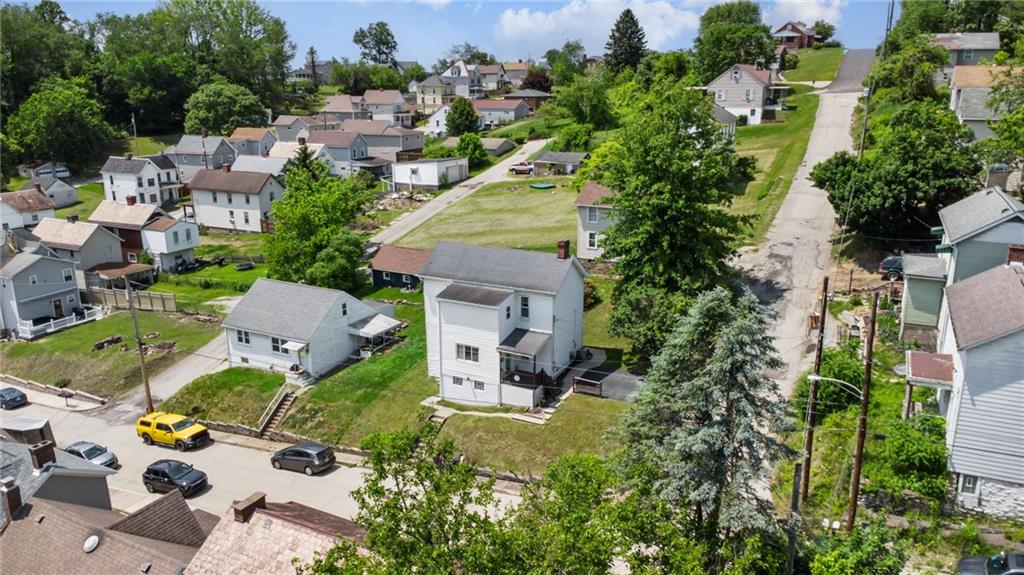600 Scott Street Penn, PA 15675 - Photo 29 of 33 an aerial view of multiple houses with yard