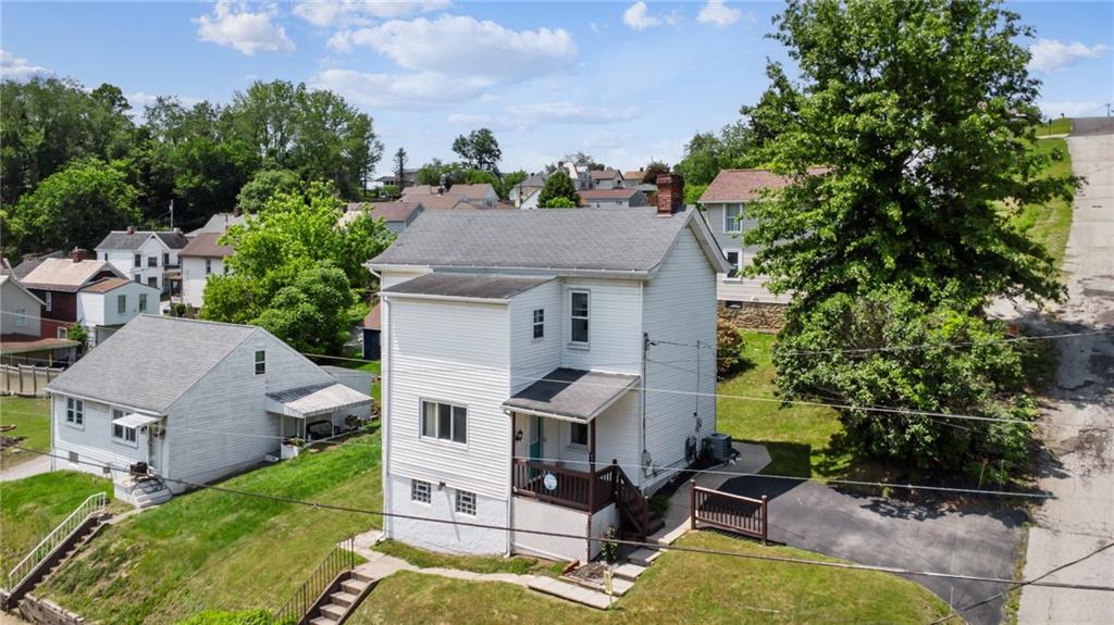 600 Scott Street Penn, PA 15675 - Photo 33 of 33 an aerial view of a house with a yard patio and fire pit