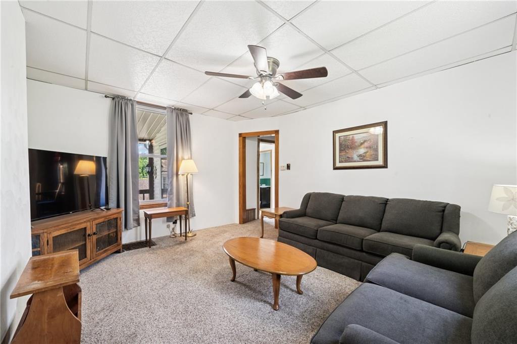 600 Scott Street Penn, PA 15675 - Photo 5 of 33 a living room with furniture and a flat screen tv