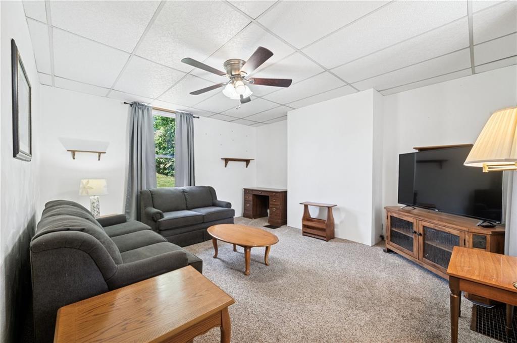 600 Scott Street Penn, PA 15675 - Photo 7 of 33 a living room with furniture and a flat screen tv