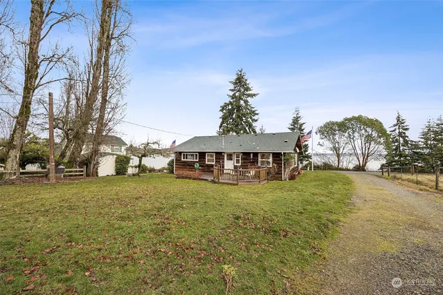 a view of a yard with an outdoor space