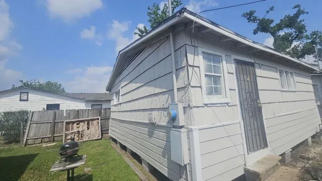 a house with trees in front of it