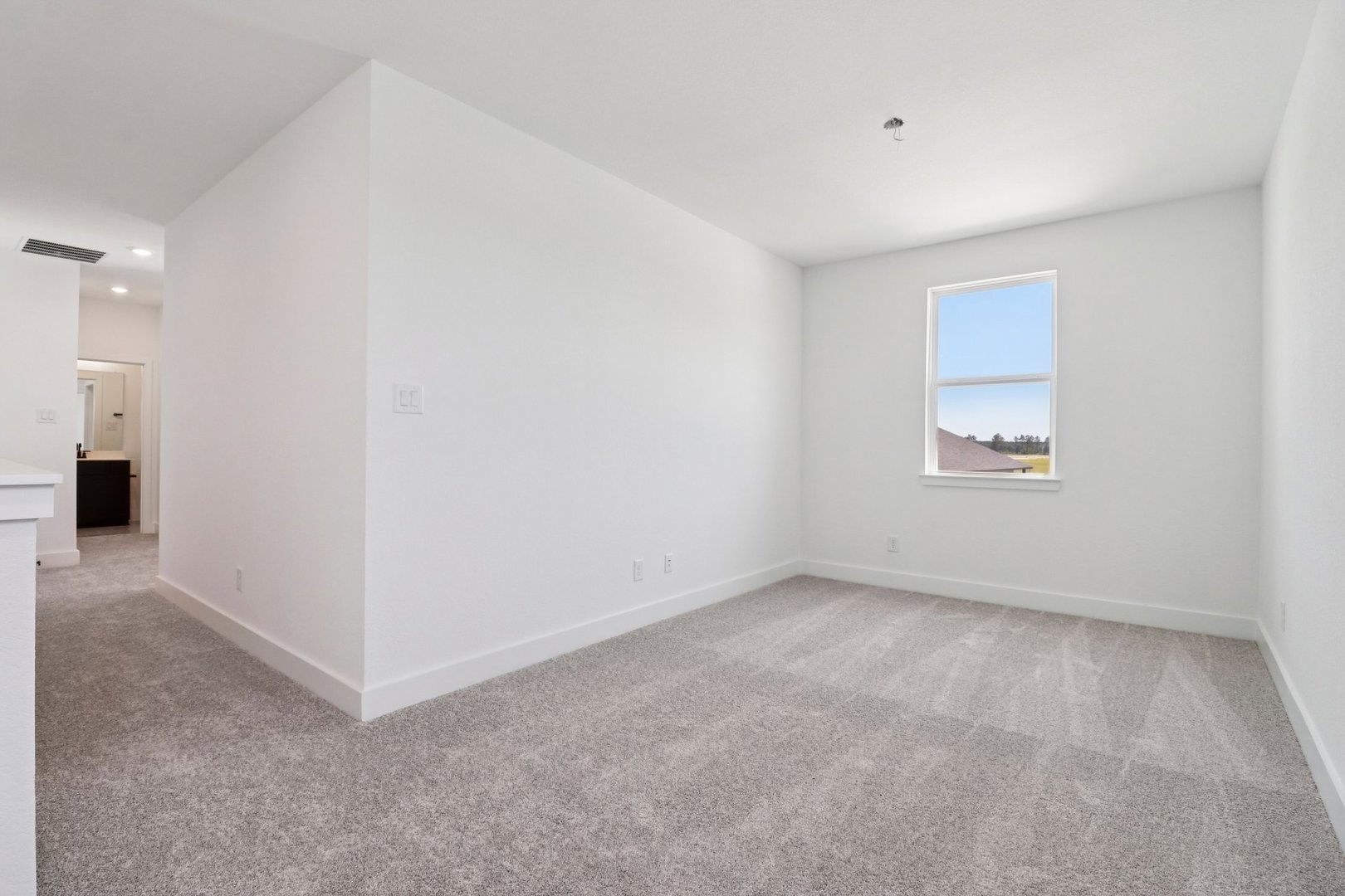 14470 Trumpet Lane Splendora, TX 77372 - Photo 18 of 27 an empty room with a workspace