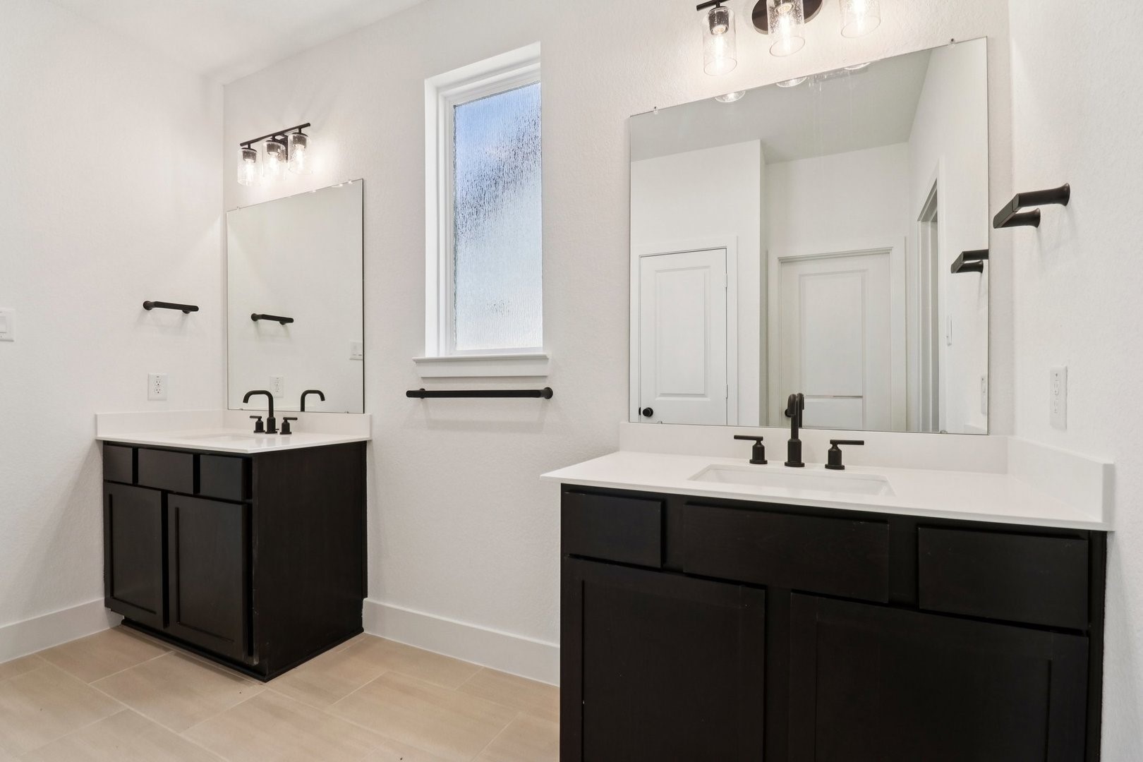 14470 Trumpet Lane Splendora, TX 77372 - Photo 10 of 27 a bathroom with a sink and a mirror