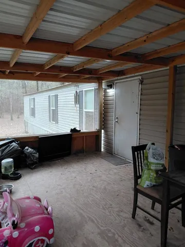 a room with furniture and a window