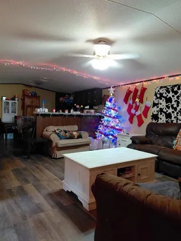 a view of a room with lots of white furniture