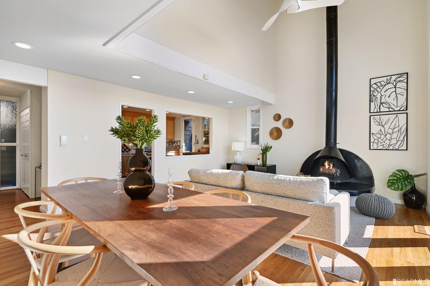 31 Avenida Drive Berkeley, CA 94708 - Photo 12 of 32 a living room with furniture potted plant and wooden floor
