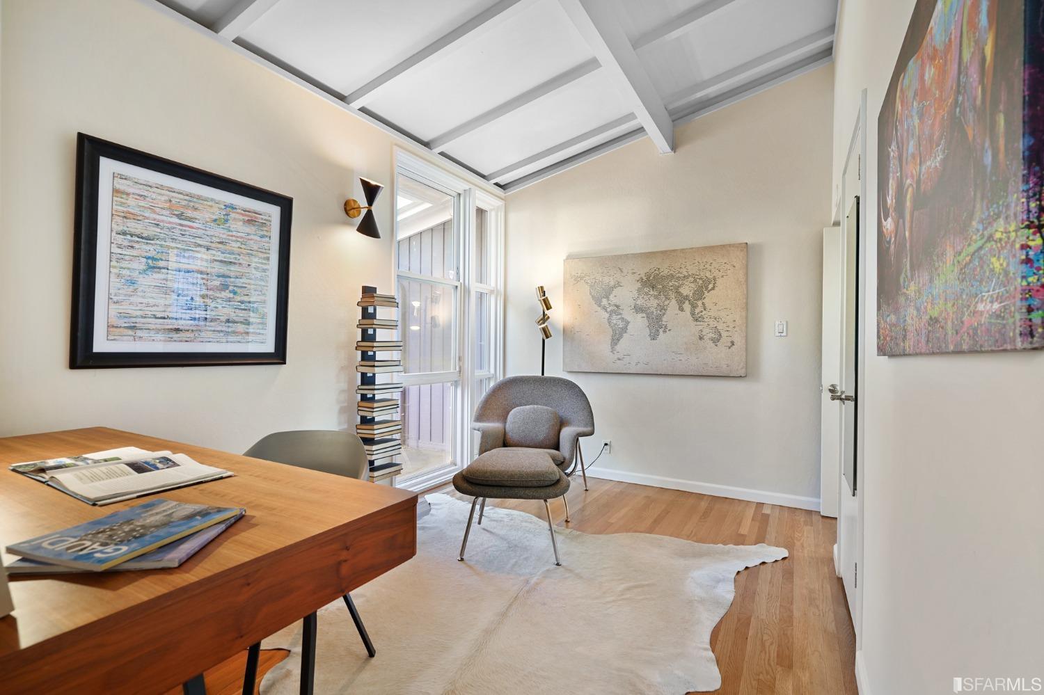 31 Avenida Drive Berkeley, CA 94708 - Photo 22 of 32 a workspace with furniture and paintings on the wall