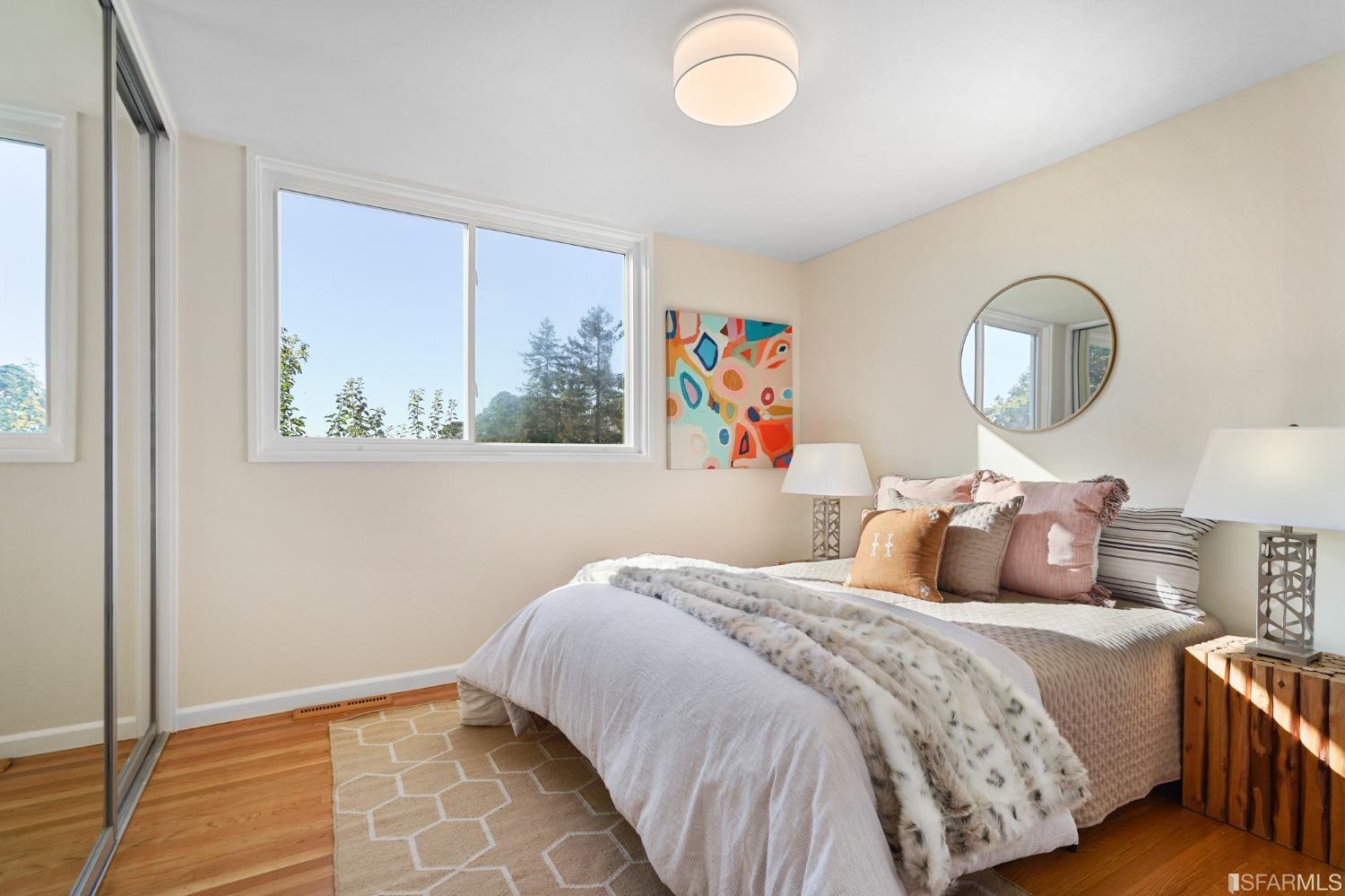 31 Avenida Drive Berkeley, CA 94708 - Photo 23 of 32 a bedroom with a bed and a painting on the wall