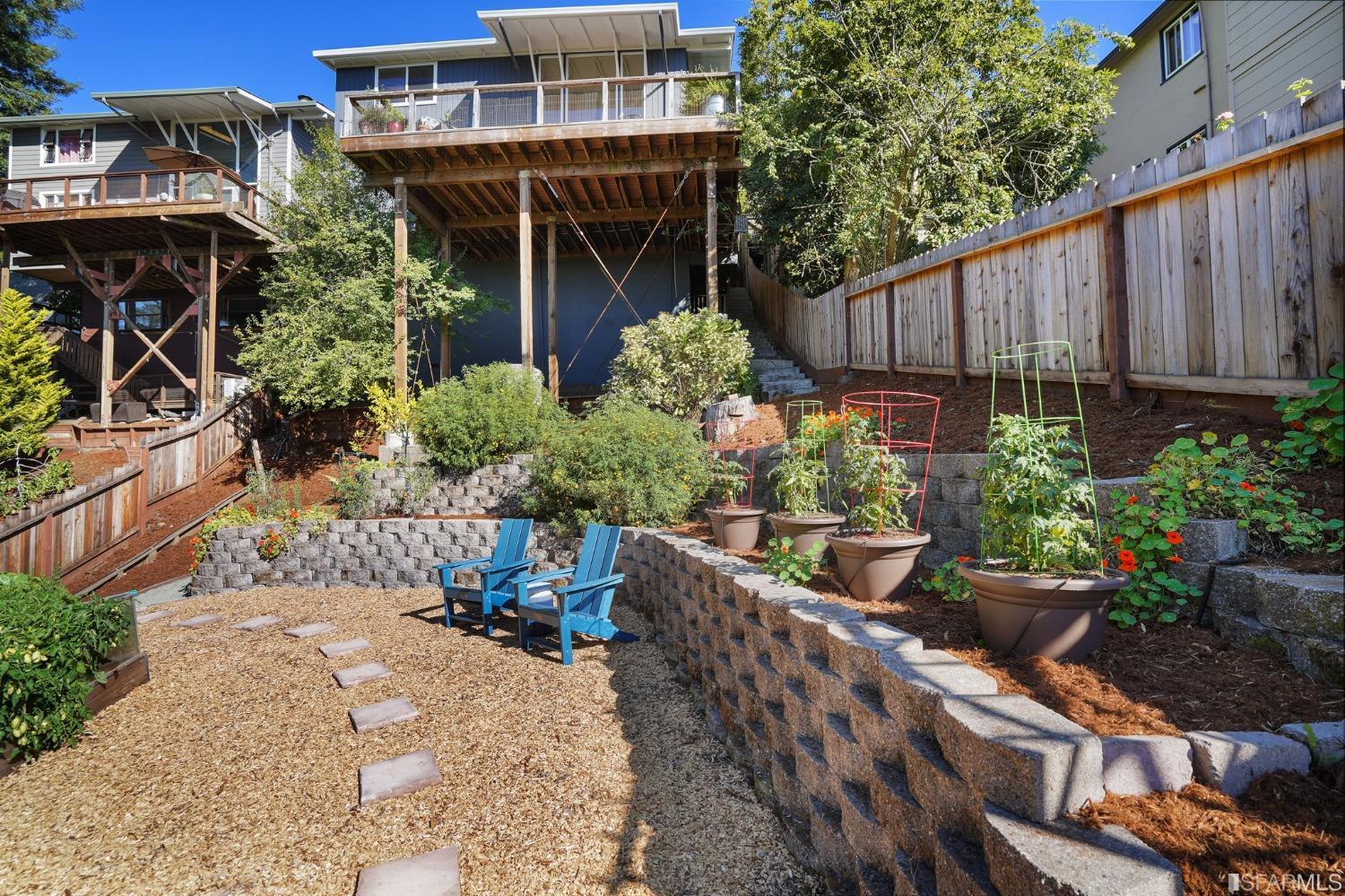 31 Avenida Drive Berkeley, CA 94708 - Photo 28 of 32 a view of a house with a flower garden