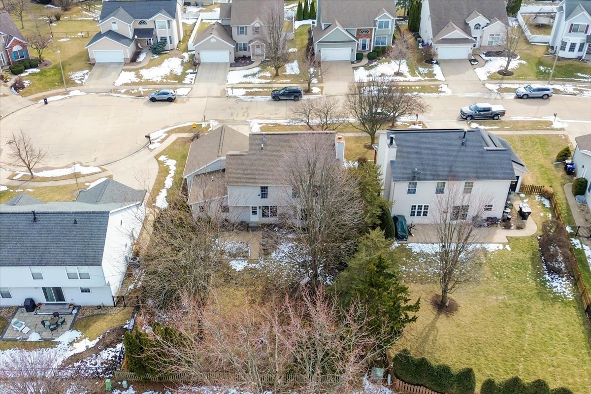 8 Minks Court Bloomington, IL 61704 - Photo 37 of 40 a view of residential houses with outdoor space and swimming pool