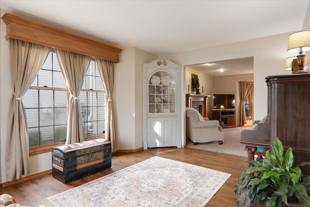 8 Minks Court Bloomington, IL 61704 - Photo 5 of 40 a living room with furniture and large windows