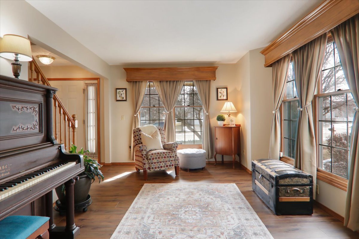 8 Minks Court Bloomington, IL 61704 - Photo 6 of 40 a living room with furniture fireplace and a window