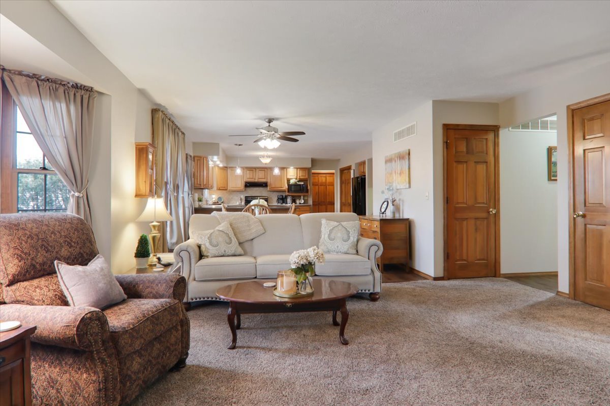 8 Minks Court Bloomington, IL 61704 - Photo 8 of 40 a living room with furniture and a large window