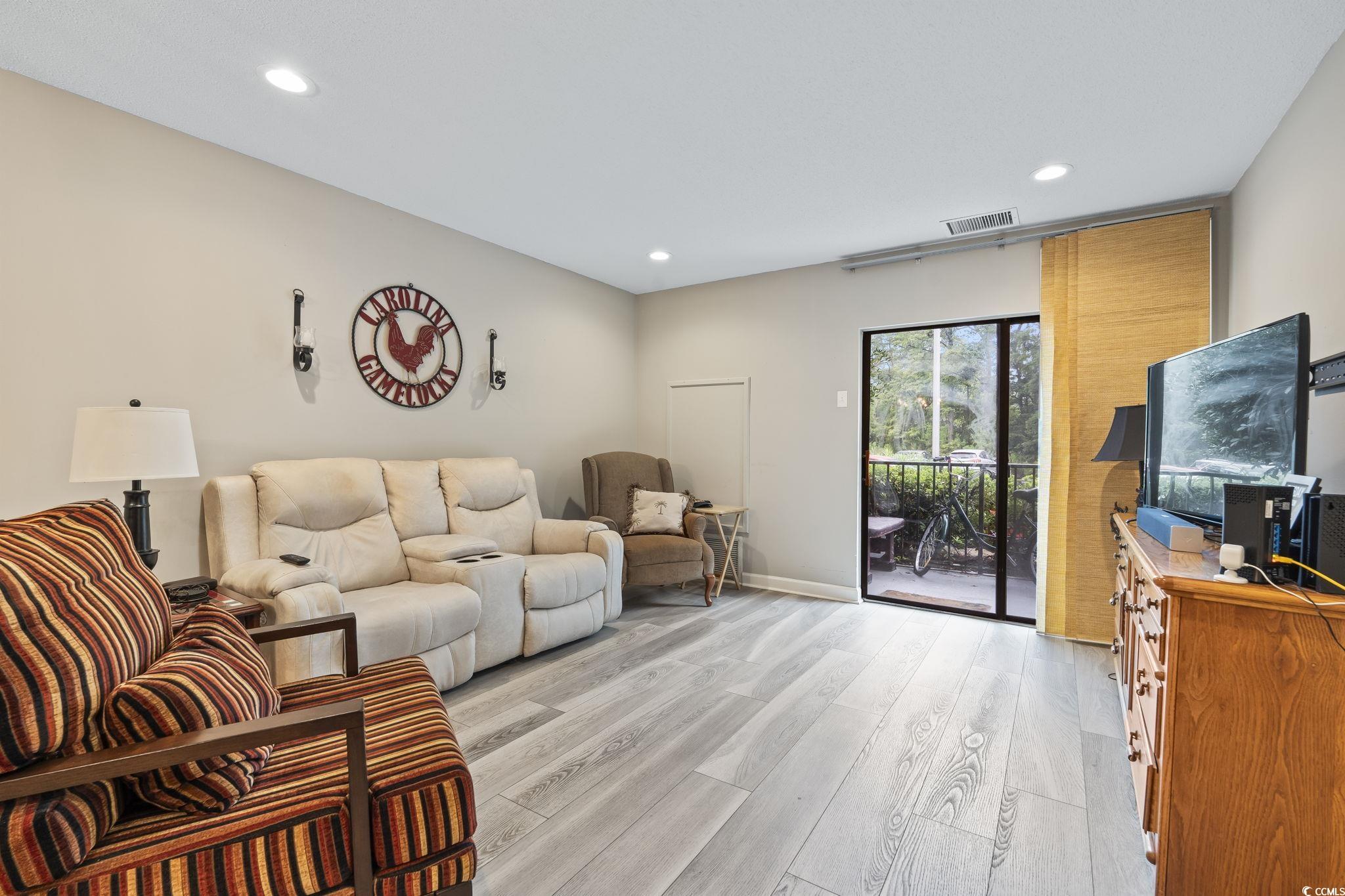 5001 Little River Road, Unit W102 Myrtle Beach, SC 29577 - Photo 7 of 38 Living room featuring light wood-style floors and recessed lighting