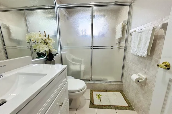 a bathroom with a toilet and a sink