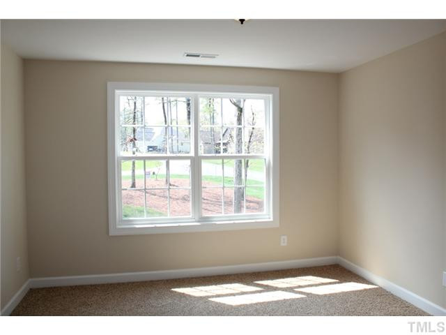 2804 Bending Tree Court Raleigh, NC 27613 - Photo 17 of 25 Frieze Carpet, Overhead Lighting, Double Door Closet! Bedroom