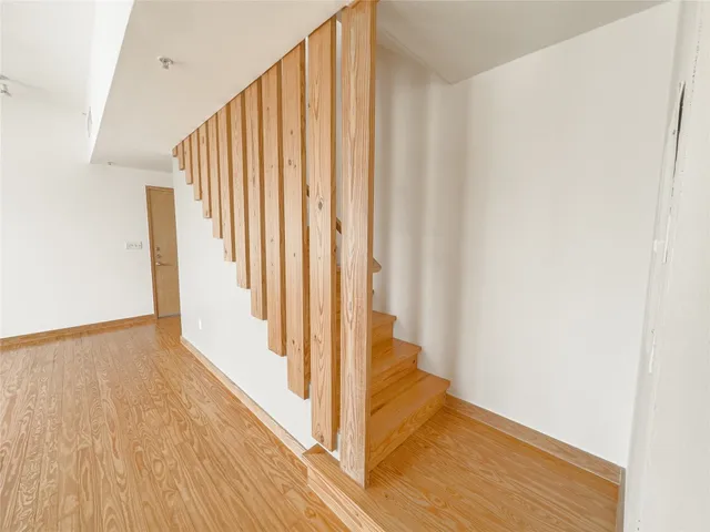 a kitchen with a stove a refrigerator and a microwave