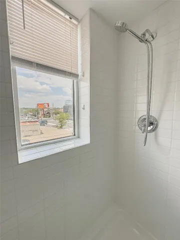a bathroom with a bathtub and a sink