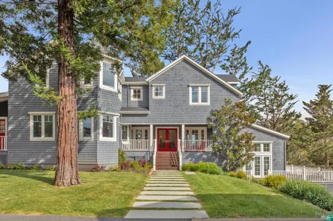 a view of dining room with furniture and window