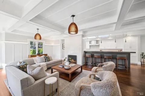 a kitchen with stainless steel appliances granite countertop a white stove and cabinets