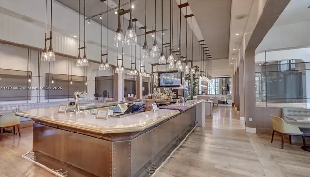 a view of a bathroom with a bathtub and shower