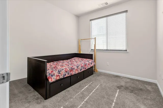 a white bath tub sitting next to a white sink