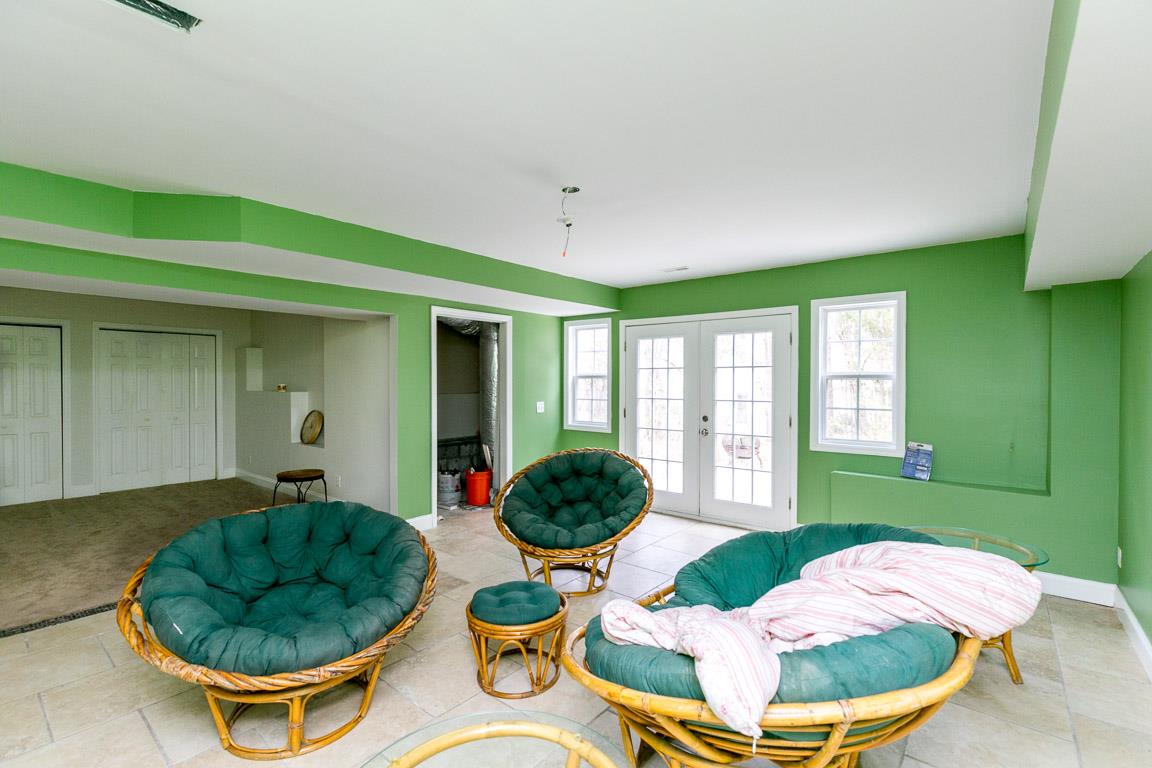 1160 Waller Road Brentwood, TN 37027 - Photo 18 of 28 a living room with furniture and a mirror