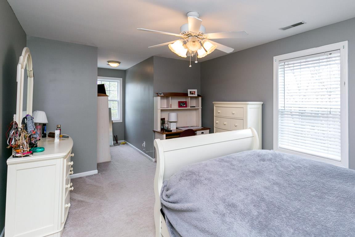 1160 Waller Road Brentwood, TN 37027 - Photo 23 of 28 a view of a bedroom with cabinet and a flat screen tv