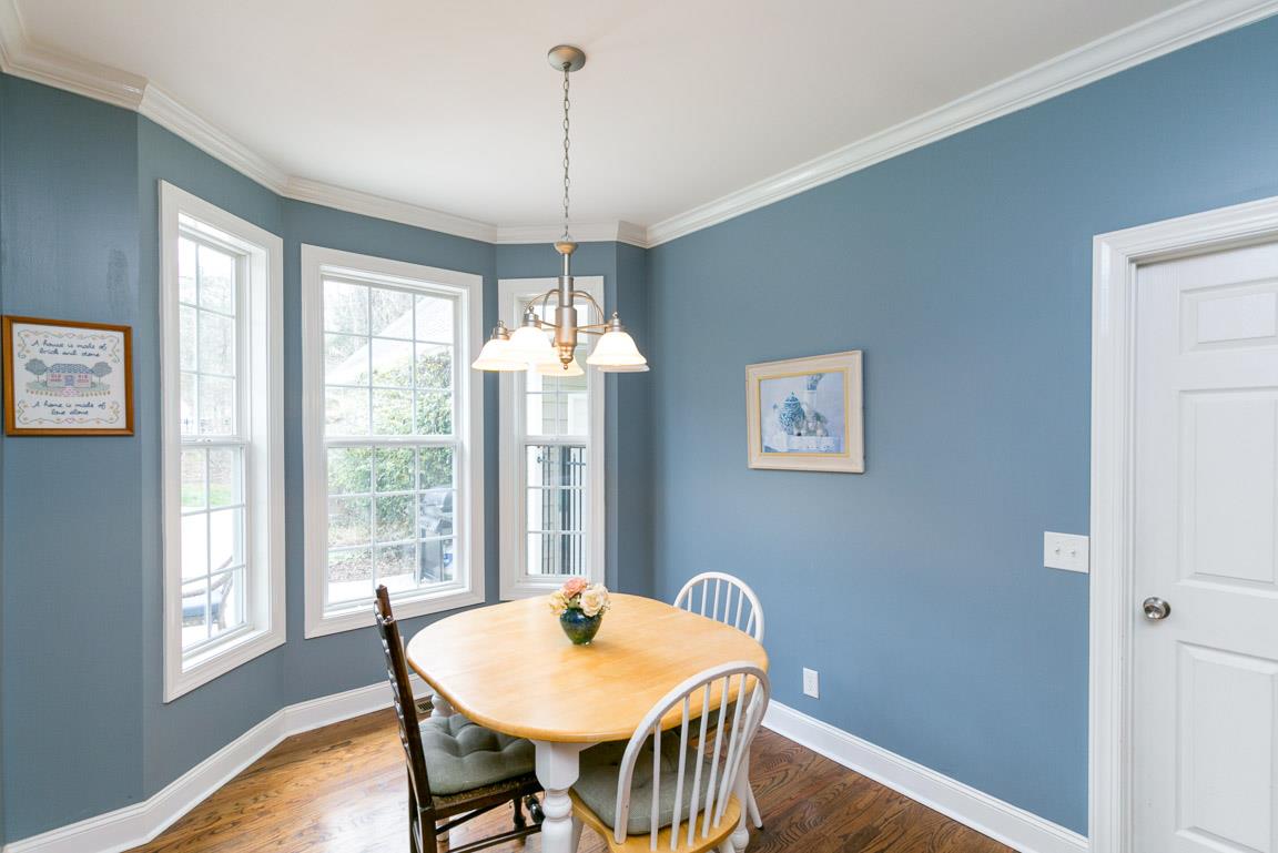 1160 Waller Road Brentwood, TN 37027 - Photo 7 of 28 a view of a dining room with furniture window and wooden floor