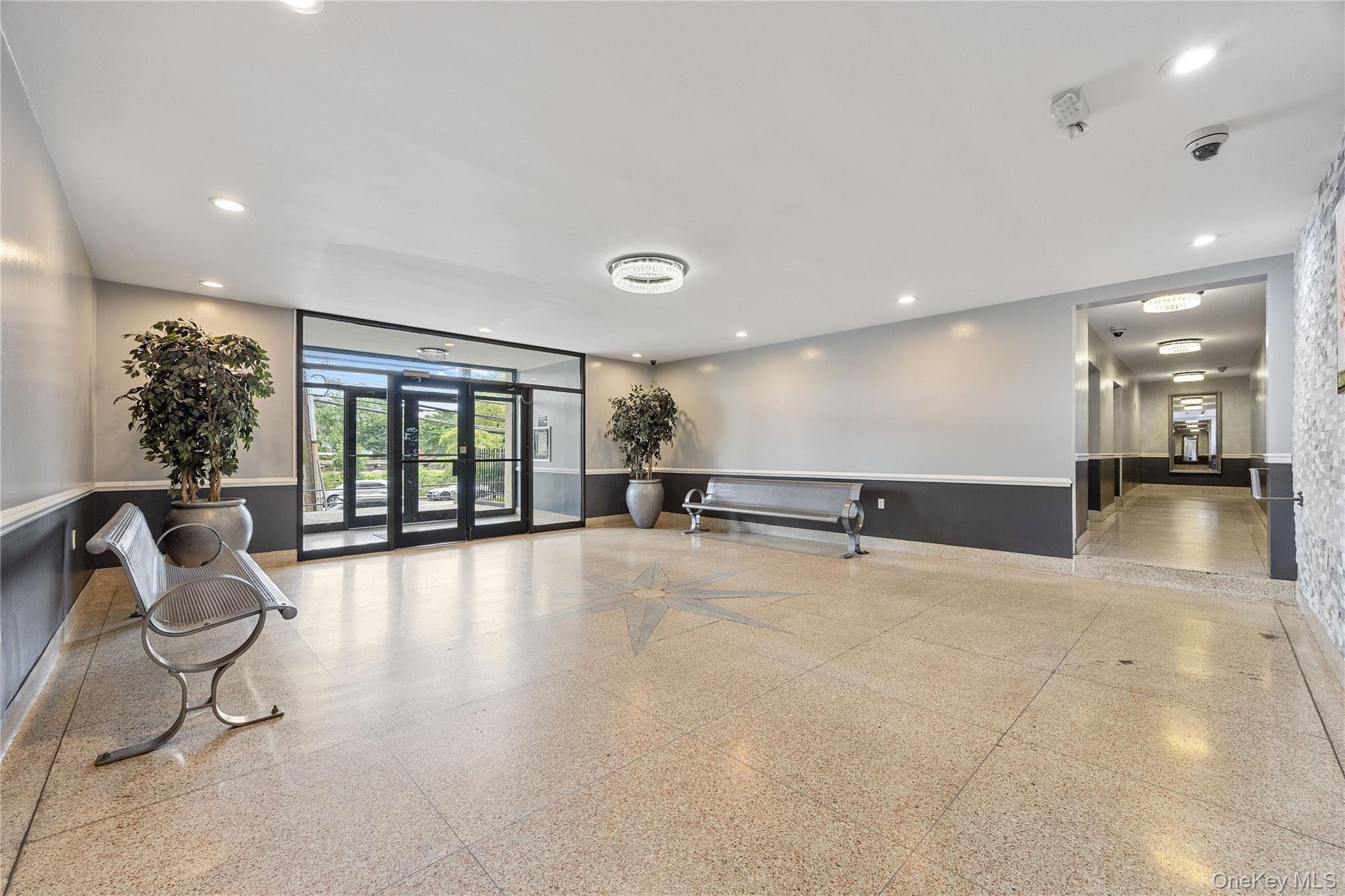 355 Bronx River Road, Unit 1I Yonkers, NY 10704 - Photo 15 of 22 Lobby featuring recessed lighting and a wainscoted wall