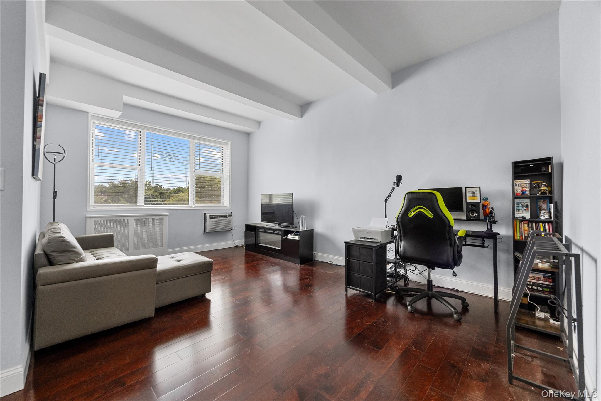 355 Bronx River Road, Unit 1I Yonkers, NY 10704 - Photo 2 of 22 Home office featuring hardwood / wood-style flooring, radiator, and beamed ceiling
