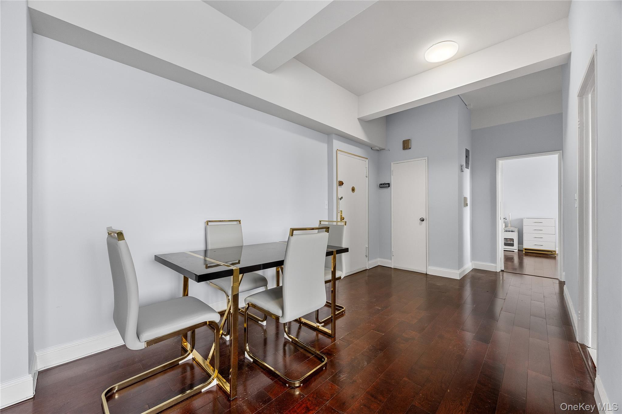 355 Bronx River Road, Unit 1I Yonkers, NY 10704 - Photo 5 of 22 Dining area with hardwood / wood-style floors and baseboards