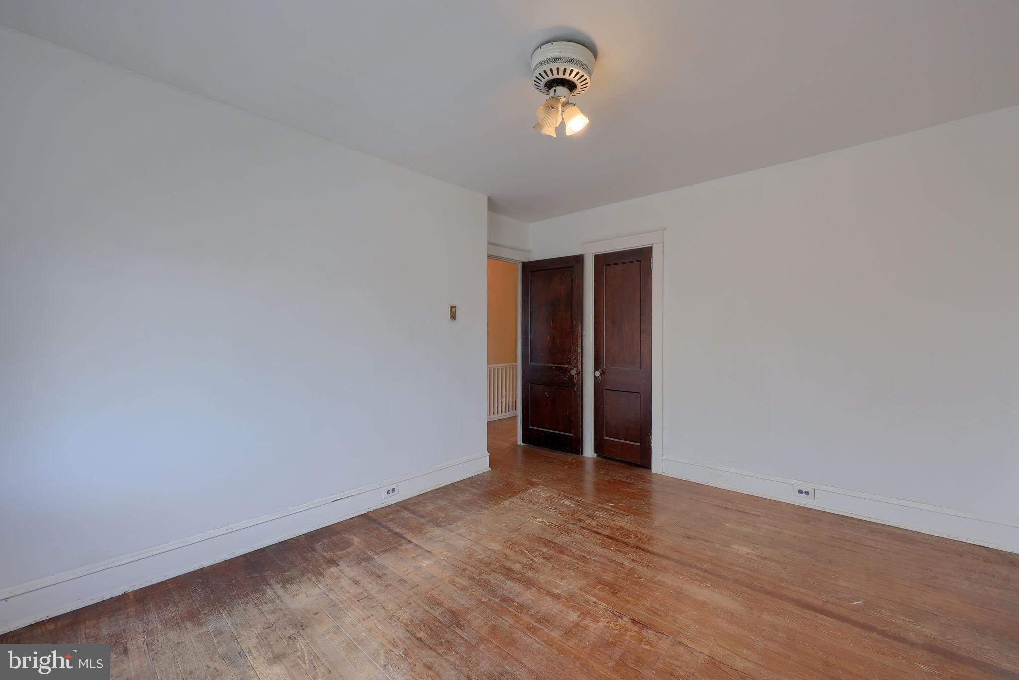 836 3rd Street Lancaster, PA 17603 - Photo 20 of 30 an empty room with closet and windows