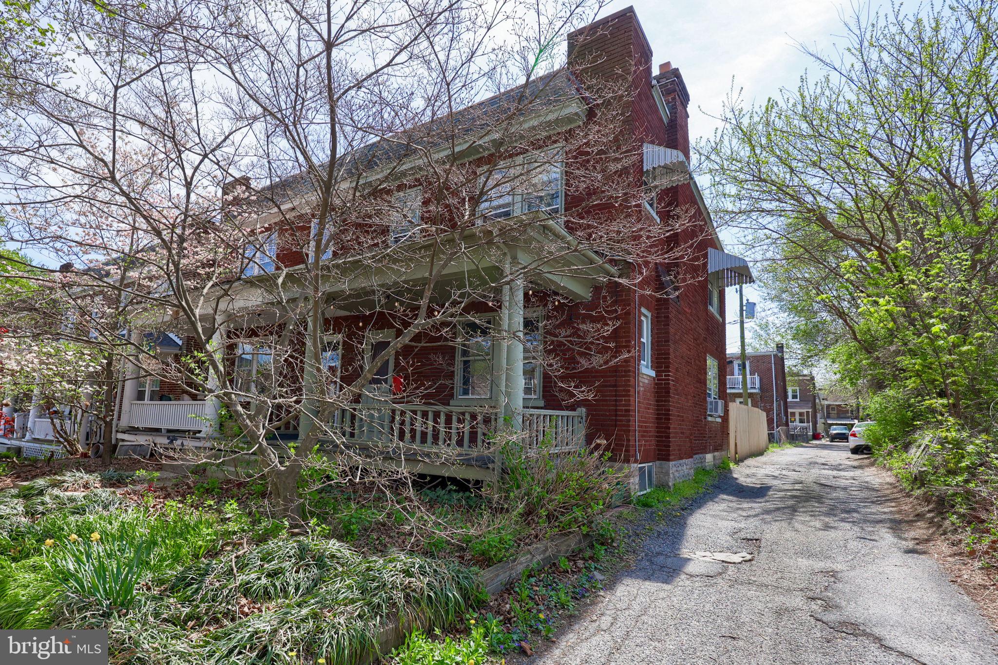 836 3rd Street Lancaster, PA 17603 - Photo 28 of 30 a front view of a house with a garden