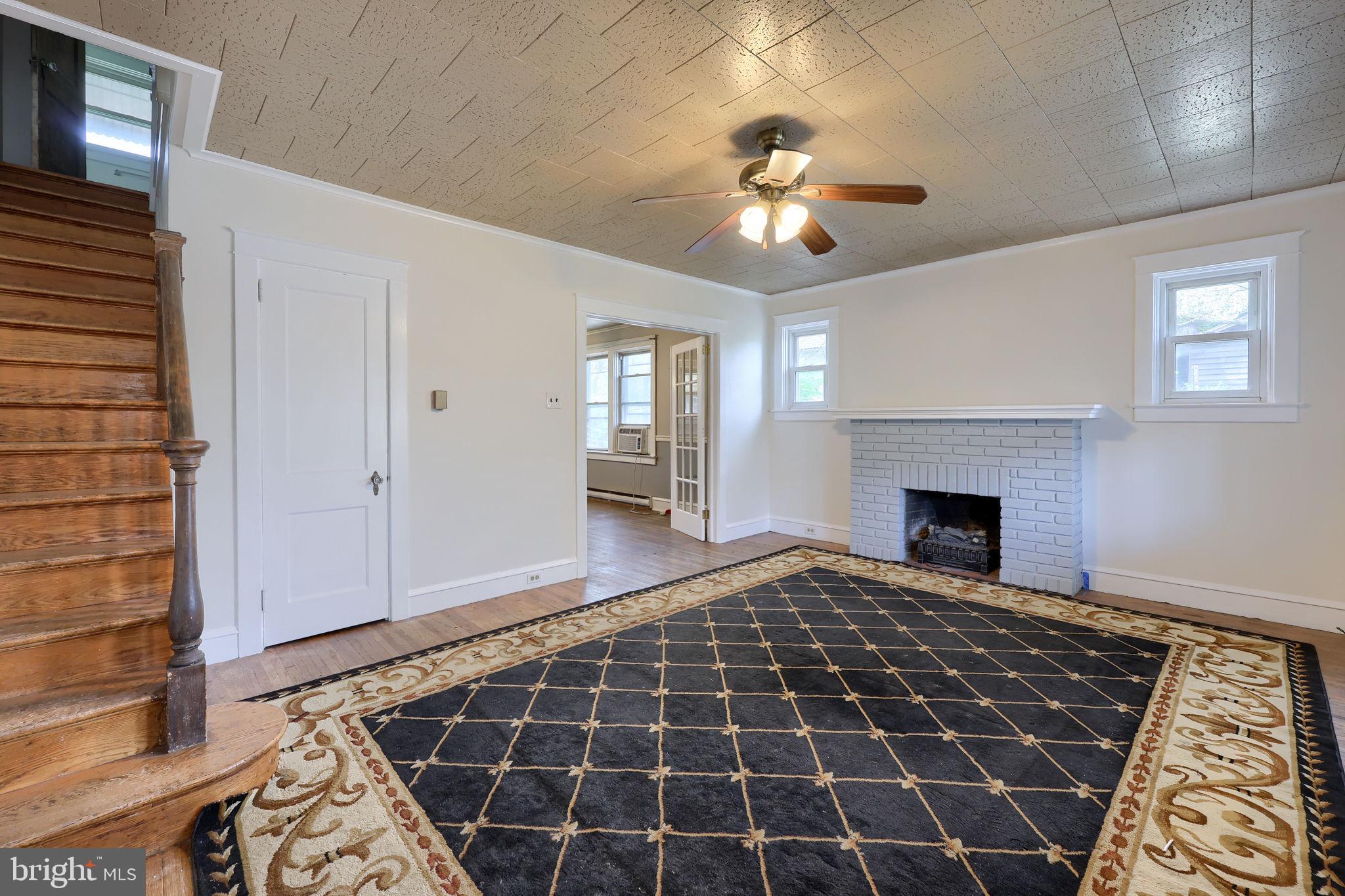 836 3rd Street Lancaster, PA 17603 - Photo 5 of 30 a view of empty room with windows and fireplace