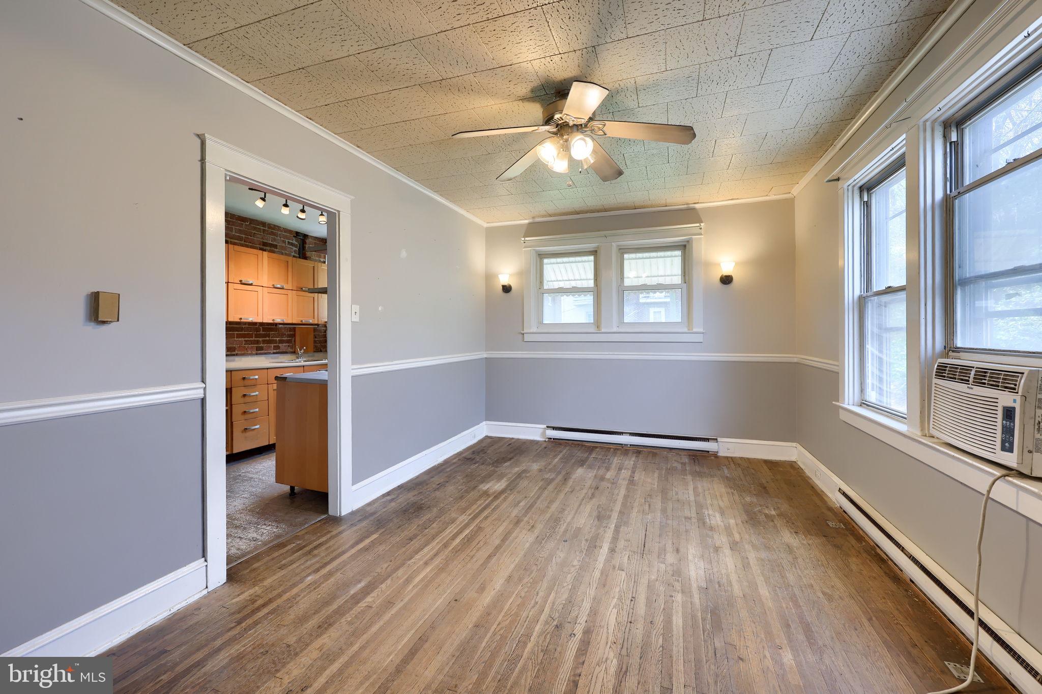 836 3rd Street Lancaster, PA 17603 - Photo 9 of 30 wooden floor in an empty room with a window