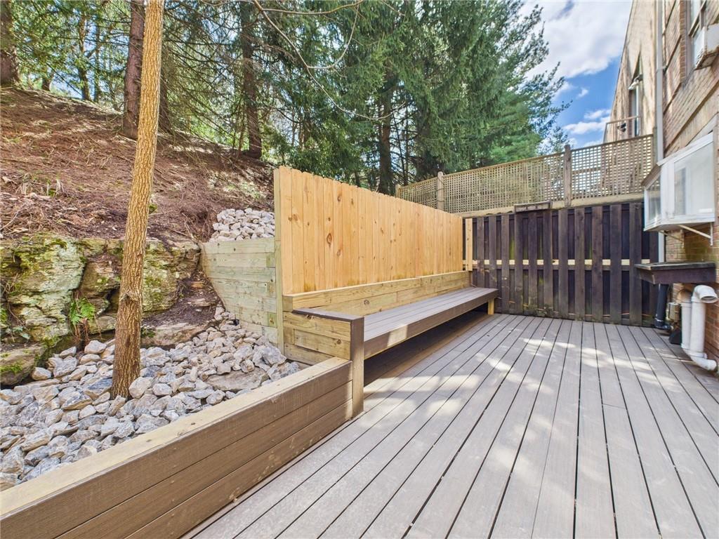 138 North Woodland Road Pittsburgh, PA 15232 - Photo 35 of 50 a view of a wooden deck with a bench