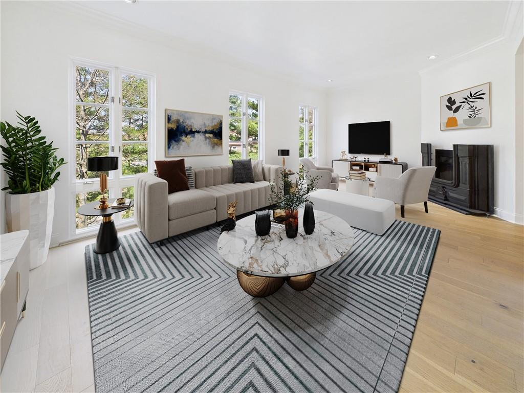 138 North Woodland Road Pittsburgh, PA 15232 - Photo 5 of 50 a living room with furniture and a flat screen tv