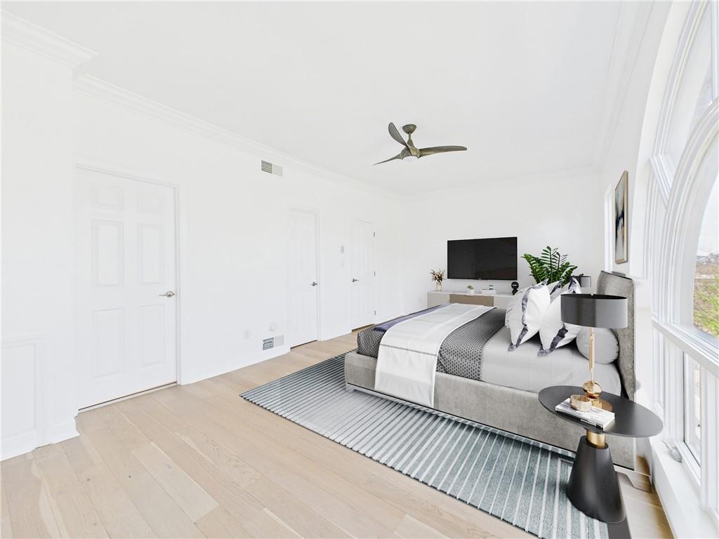 138 North Woodland Road Pittsburgh, PA 15232 - Photo 6 of 50 a bedroom with a bed and a couch