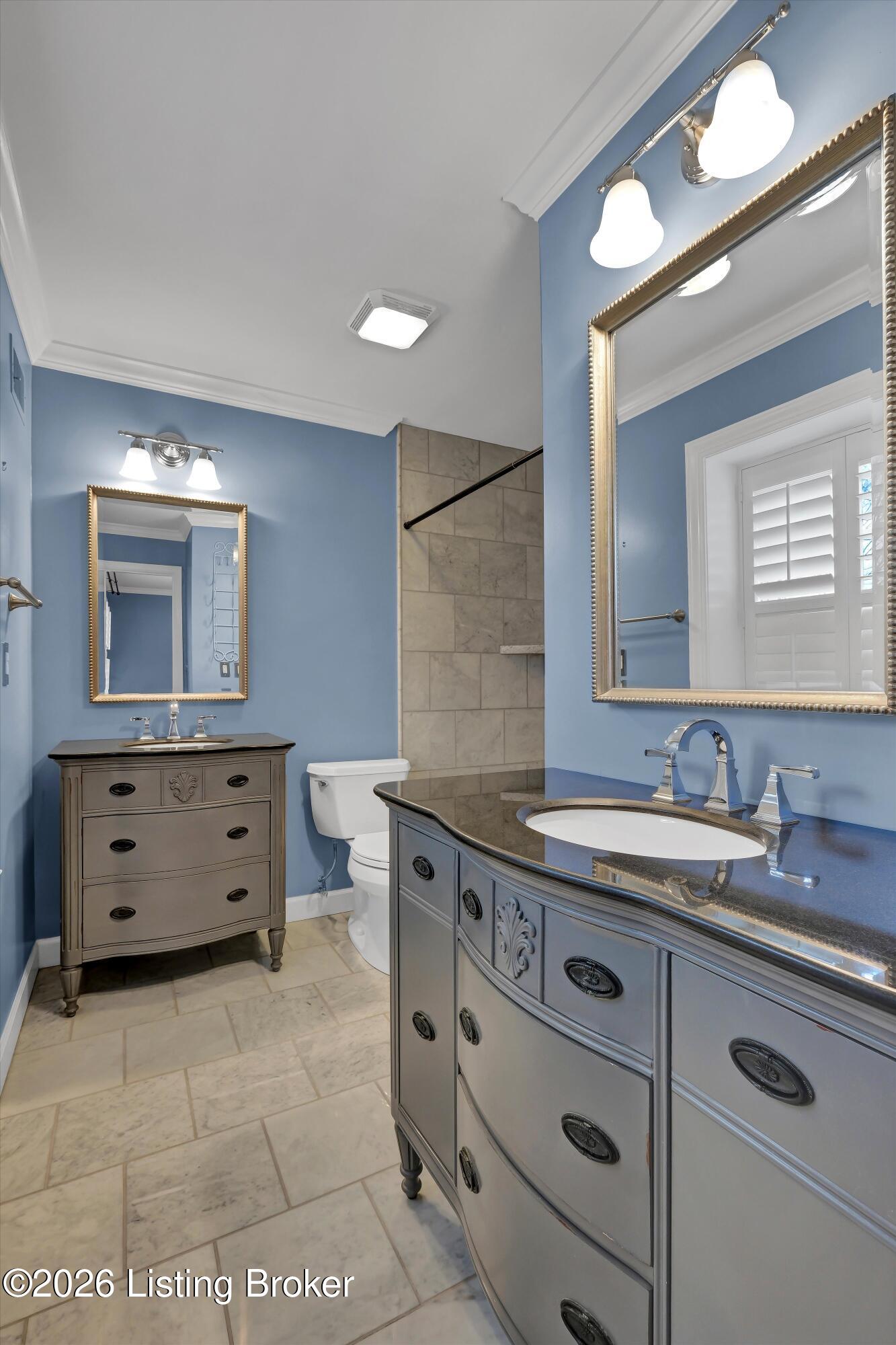 6108 Rodes Drive Northfield, KY 40222 - Photo 32 of 68 Separate vanities and updated lighting