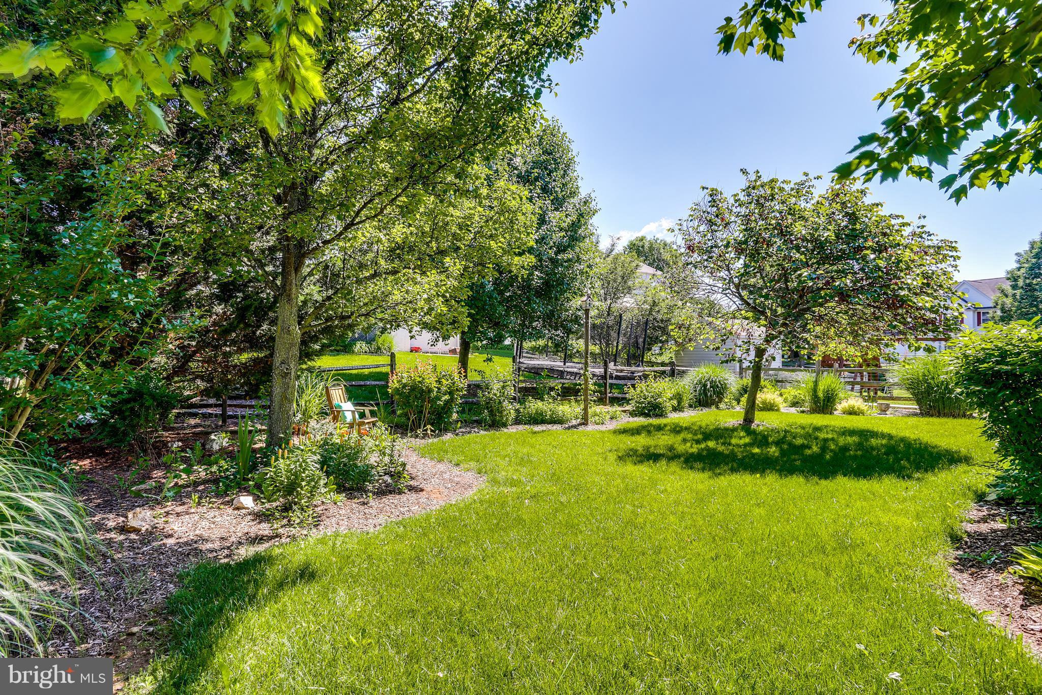 1407 Crossbow Road Mount Airy, MD 21771 - Photo 19 of 21 Landscaped Yard